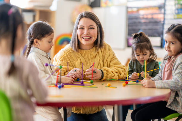 istock Kindergarten Students with Their Teacher 1457758273