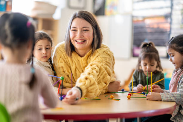 istock Kindergarten Students with Their Teacher 1457758280