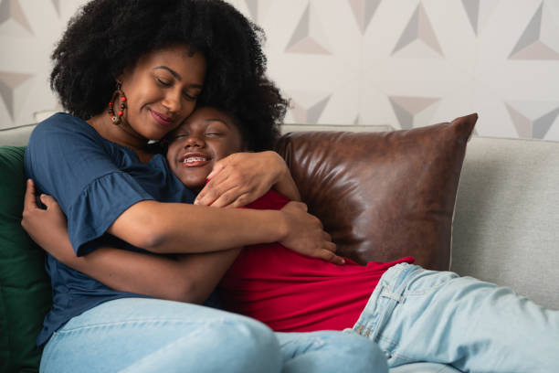 istock Daughter hugs mother 1457760264