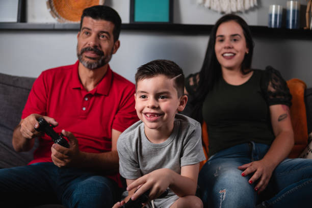 istock child plays video games with grandfather 1457761133