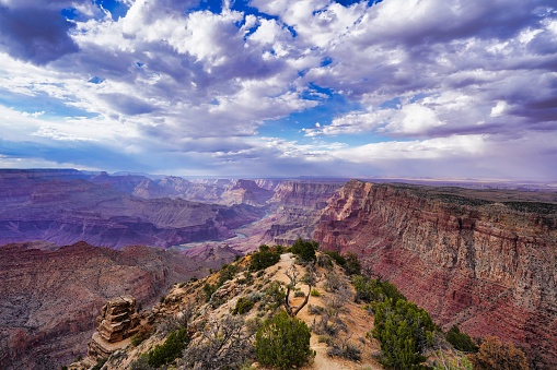 Grand Canyon in day time, cloudscape over view of Colorado river