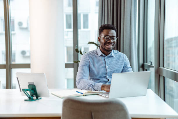 istock Young businessman working at his office 1457767829