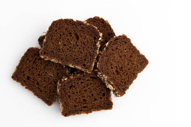 istock slices of rye bread on white background, top view 1457767864