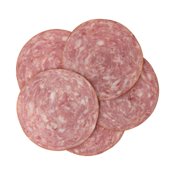 istock ham cut into pieces isolated on white background 1457767874