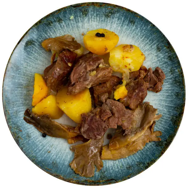 Photo of Braised veal with potato and forest mushrooms