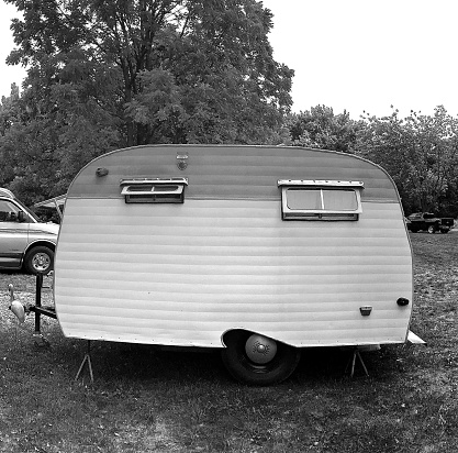 Vintage Travel Trailer - 9/17/2016: A vintage camper trailer parked at a camping site.