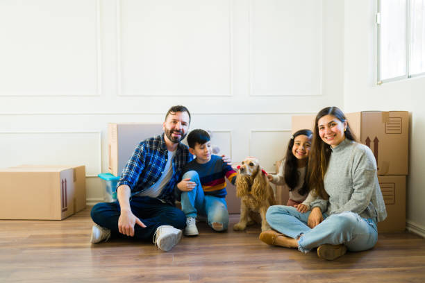istock Homeowners moving with their children and pet 1457775163
