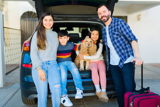 istock Smiling family preparing for a car road trip 1457775207