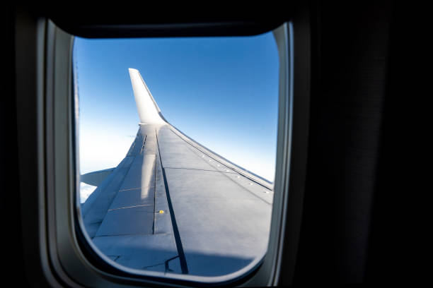 istock View of an Airplane Wing from Window Seat 1457775569