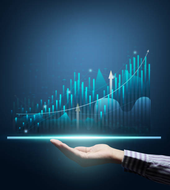 istock Holographic graph with growing indicators and a woman's hand. Bu 1457775620
