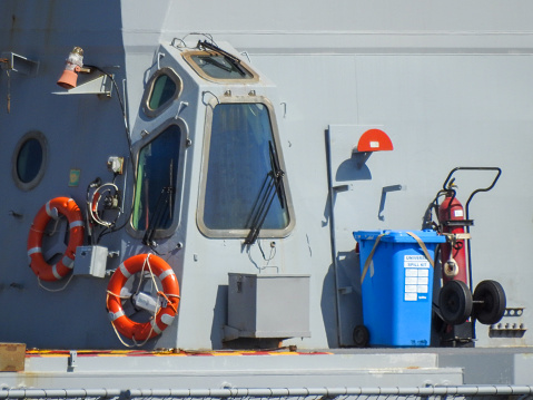 US Coast Guard Ship Entering San Diego Harbor. Crew seen on deck.