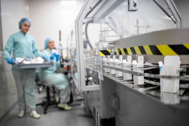 Pharmaceutical Industry Workers in Action stock photo