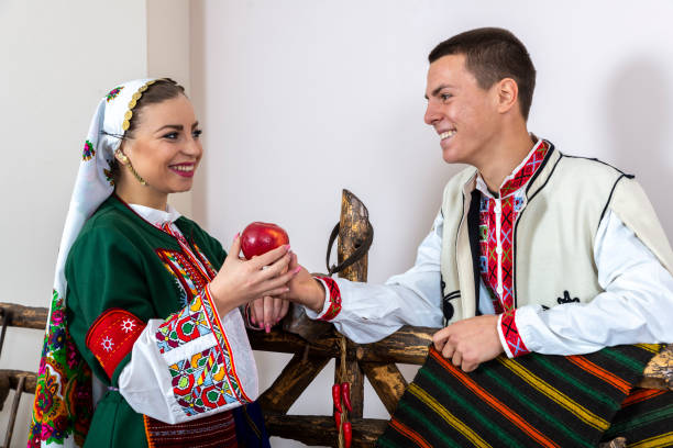 young people in traditional Bulgarian costumes.