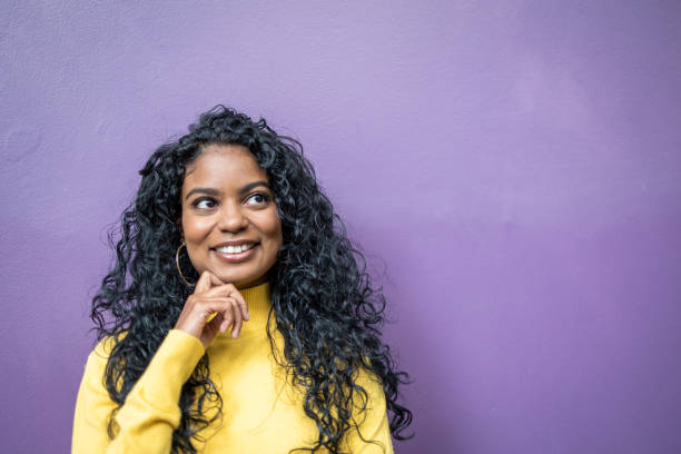 istock Thoughtful woman thinking about a new idea and the future while using her imagination 1457787628