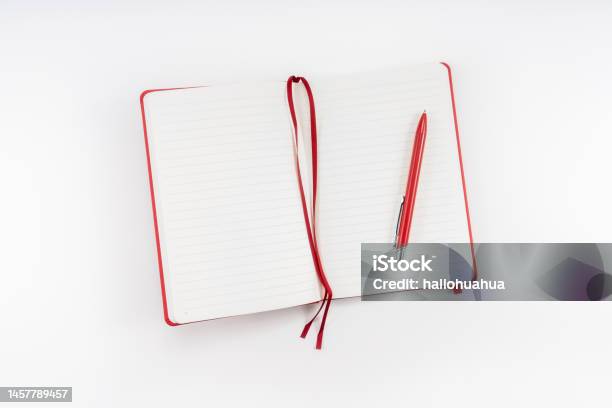 Red Notebook With A Pen Isolated On White Stock Photo - Download Image Now - Note Pad, Moleskin, Pencil