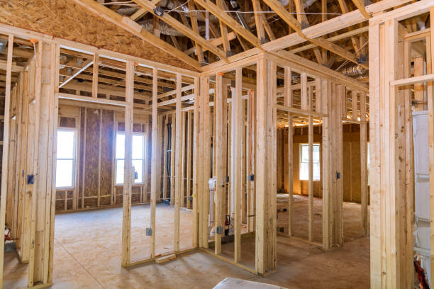 istock A new residential construction project is framing an unfinished wood frame house with basic electrical wiring as part of the construction process 1457797577