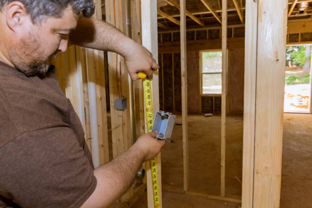 istock Electrical socket boxes inside a construction of a new residential of framing an unfinished wood frame 1457799690