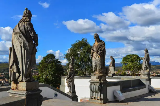 A partial view of the World Heritage-listed Twelve Prophets sculptures by the famous baroque artist Aleijadinho, on the Santuário do Bom Jesus de Matosinhos, Congonhas, Minas Gerais state, Brazil