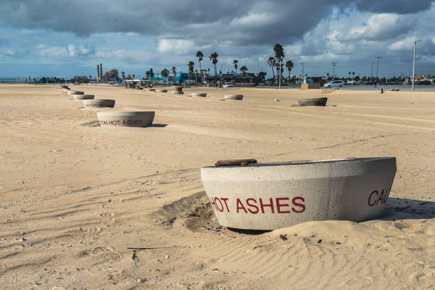 caution hot ashes - santa monica beach beach california wave imagens e fotografias de stock