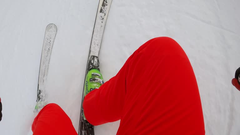 Male skier alpine skiing downhill, point of view