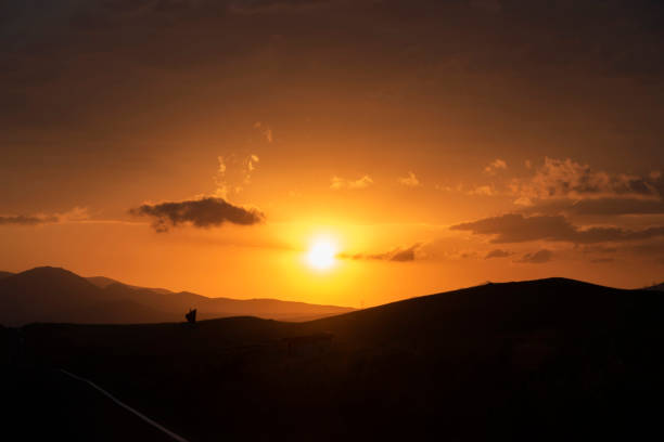 istock beautiful sunset over the mountains 1457821822