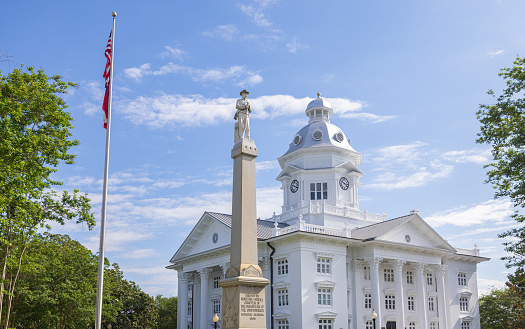 Moultrie, Georgia, USA - April 17, 2022: The Colquitt County Courthouse and it is Confederate Monument