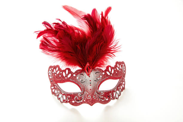 istock Carnival Venetian mask with red feather decoration isolated on white 1457833825