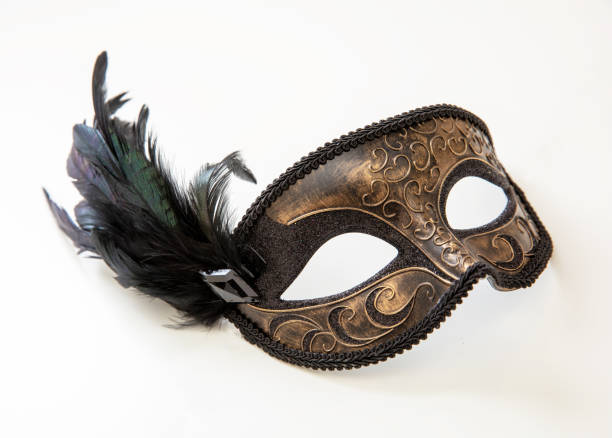 istock Carnival Venetian mask with black feather decoration isolated on white 1457833848