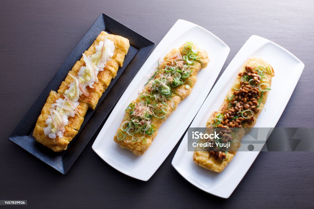 Large Tochio deep-fried tofu made in Tochio, Niigata Prefecture Japanese processed foods made from soybeans, tofu, fried tofu, and other vegan foods Aburaage Stock Photo