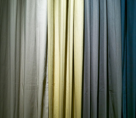 Multi-colored vertical blinds pattern. Colorful fabrics, fabric style decoration.