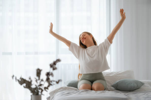 istock woman enjoying sunny morning 1457848459
