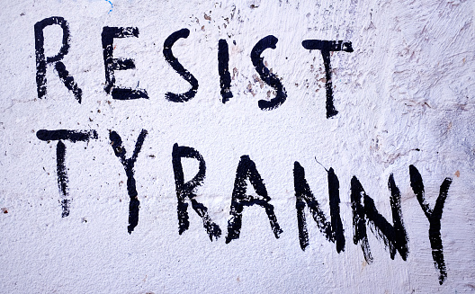 Graffitist urges readers to resist tyranny.