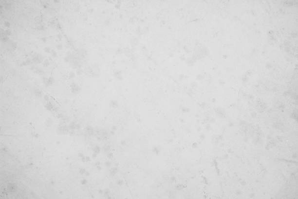 istock Close-up retro plain white color concrete wall or grey colour countertop background texture cement stone work. Design element concept for show or advertise or promote product and content on display. 1457856835