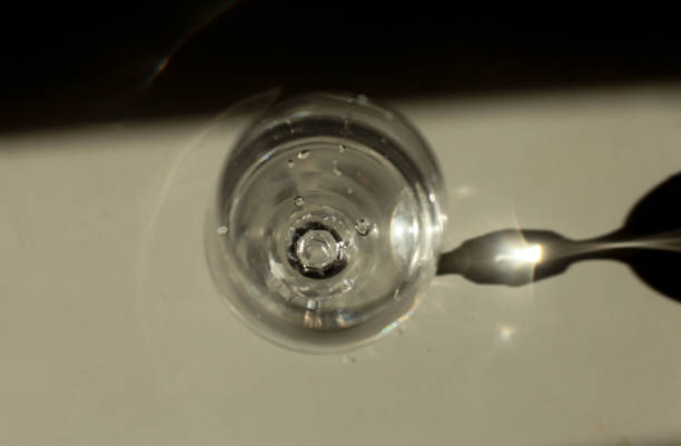 Extreme close-up of glass of water.