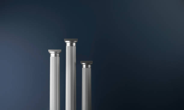 istock Three classical style silver columns arranged as a podium on a dark blue background 1457869160
