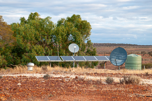 Off the grid services of power, communication and water for living below ground in a dugout, White Cliffs Australia