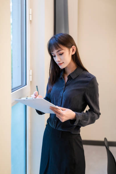 istock A business woman who works in an office 1457873607