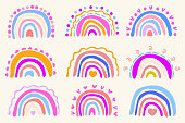 istock Set of colorful doodle vector rainbow kids child illustrations in different styles on background. 1457876107