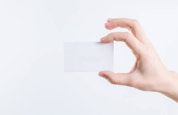 istock A blank business card in one hand 1457884929