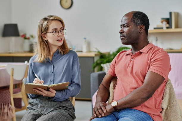 istock Psychologist asking questions during therapy 1457895800