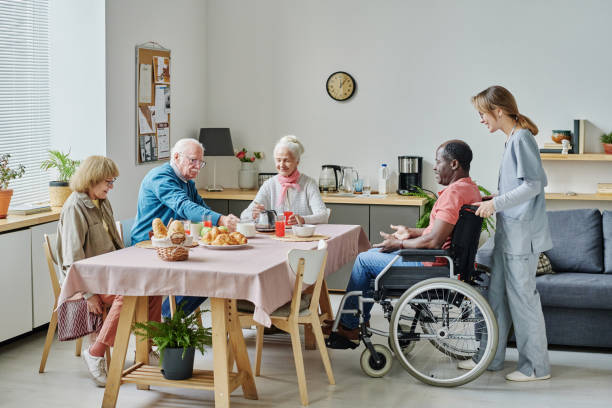 istock Senior people having breakfast together 1457898570
