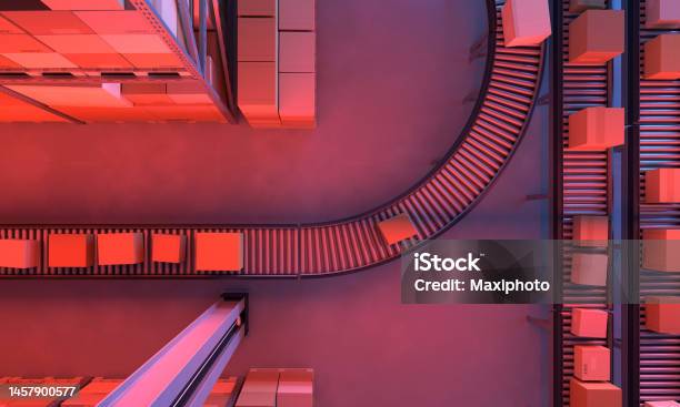 Top View Of Conveyor Belts Transporting Boxes In A Large Warehouse Night Time Stock Photo - Download Image Now