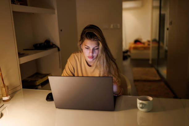 istock Young woman studying at home 1457900665
