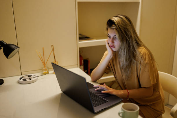 istock Young woman studying at home 1457900903