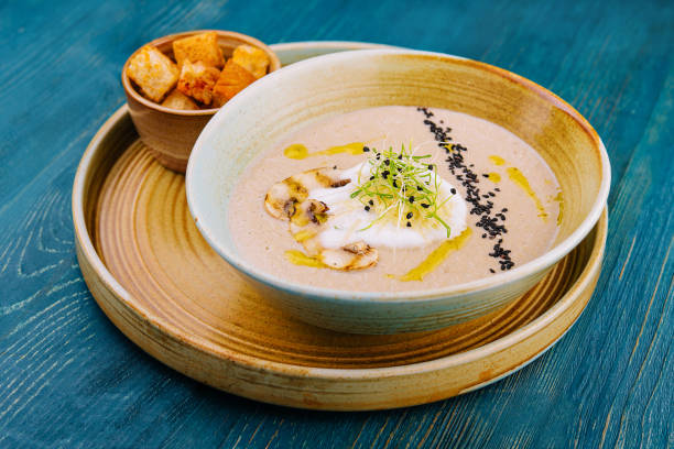 istock Mushroom cream soup with ingredients top view 1457901896