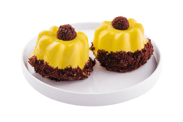 istock dessert in yellow icing on plate 1457902549