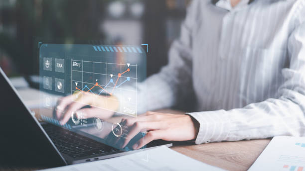 istock business people read online business statistics chart reports to analyze and improve corporate strategy ,Manage financial and marketing documents, Company growth information,Managing Business Insights 1457904772