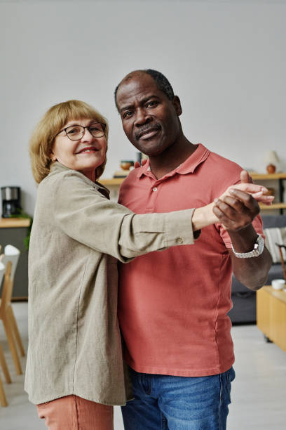 istock Senior couple enjoying dance together 1457906517
