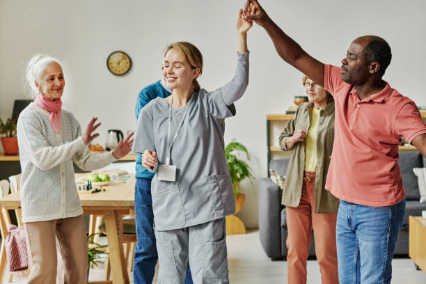 istock Dance lesson in nursing home with senior people 1457906598