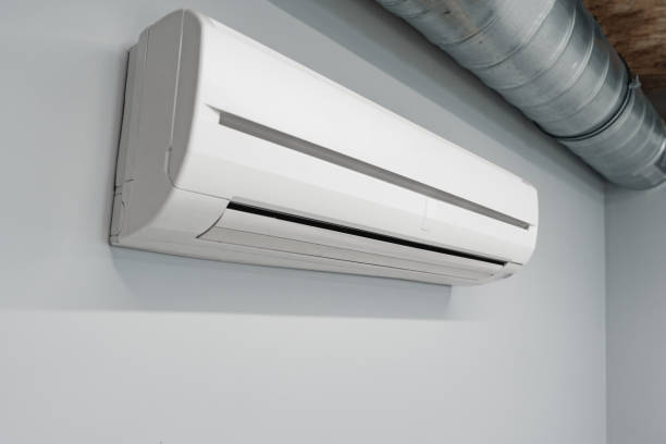 istock Air conditioner on gray wall room interior 1457908749